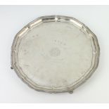 A silver engraved salver with presentation inscription, raised on pad feet Sheffield 1942, 30cm, 770