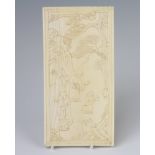 A late 19th Century carved ivory table screen in the form of a figures with deer in an extensive