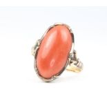 A 14ct yellow gold cabochon cut coral ring 3.4 grams, size M