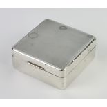 A silver engine turned cigarette box Birmingham 1937, 8cm Numerous dents to the box