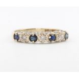 A 9ct yellow gold sapphire and diamond ring 1.3 grams, size J 0