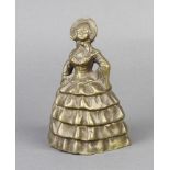 A 19th Century bronze bell in the form of a crinoline lady, the clapper in the form of legs 12cm x