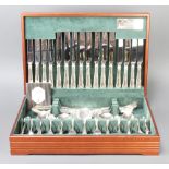 A canteen of plated cutlery for 8 contained in a mahogany canteen