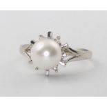A 10ct white gold cultured pearl and diamond ring, 2.1 grams, size J