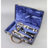 A clarinet marked 238205 contained in a Boosey and Hawkes case