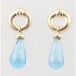 A pair of 9ct yellow gold blue topaz drop earrings 26mm, 6.4 grams