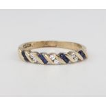 A 9ct yellow gold diamond and sapphire ring 2.5 grams, size P 1/2