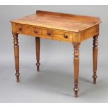 Heals and Sons London, a Victorian rectangular mahogany side table with raised back, fitted 2 frieze