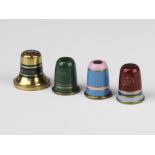 Two modern metal wood settons in the form of thimbles with commemorative scenes and 2 others