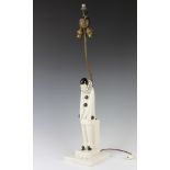 Roland Paris, a porcelain lamp in the form of a standing Pierrot on a stepped base with dropped