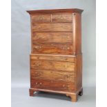 A Georgian mahogany chest on chest, the upper section with moulded and dentil cornice, canted