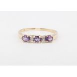 A 9ct yellow gold amethyst and diamond ring 0.9 grams, size N 1/2