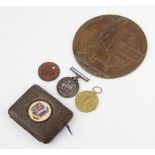 A World War One pair of medals to 7538 Pte. T.Taylor.L.N.Lan.R together with a death plaque, dog tag