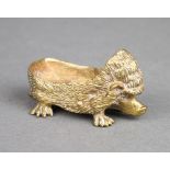 A Victorian brass pen wipe/pin cushion in the form of a hedgehog, the base marked GES6R91 3cm h x