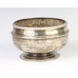 A silver pedestal bowl with egg and dart rim London 1927, 210 grams There are numerous dents to this