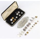 An Art Deco cased mother of pearl gilt dress set of studs and minor jewellery