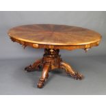A Victorian Scottish oval inlaid walnut snap top breakfast table with quadrant veneers and