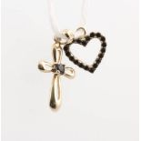 A 9ct yellow gold sapphire cross pendant 0.6 grams and a sapphire set heart pendant 0.7 grams