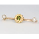 A 9ct yellow gold peridot and seed pearl bar brooch