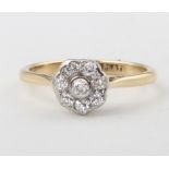 An 18ct yellow gold 8 stone diamond cluster ring approx. 0.25ct, 3.2 grams, size O