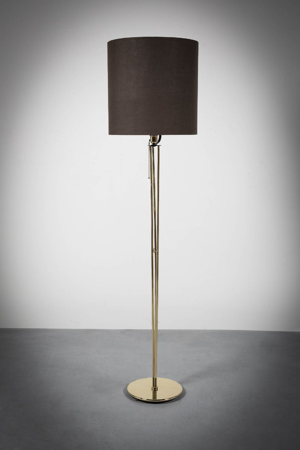 A BRASS STANDARD LAMP