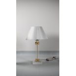 A PERSPEX AND GILT MOUNTED TABLE LAMP,