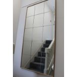 A CONTEMPORARY COMPARTMENTED WALL MIRROR