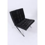 A BARCELONA STYLE CHAIR, in the style of Mies van der Rohe, with black leather seats *Please note: