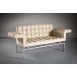 A WHITE LEATHER SQUARE BACK SOFA, BY ALLIVAR, with angular armrests, on a metal base, with printed