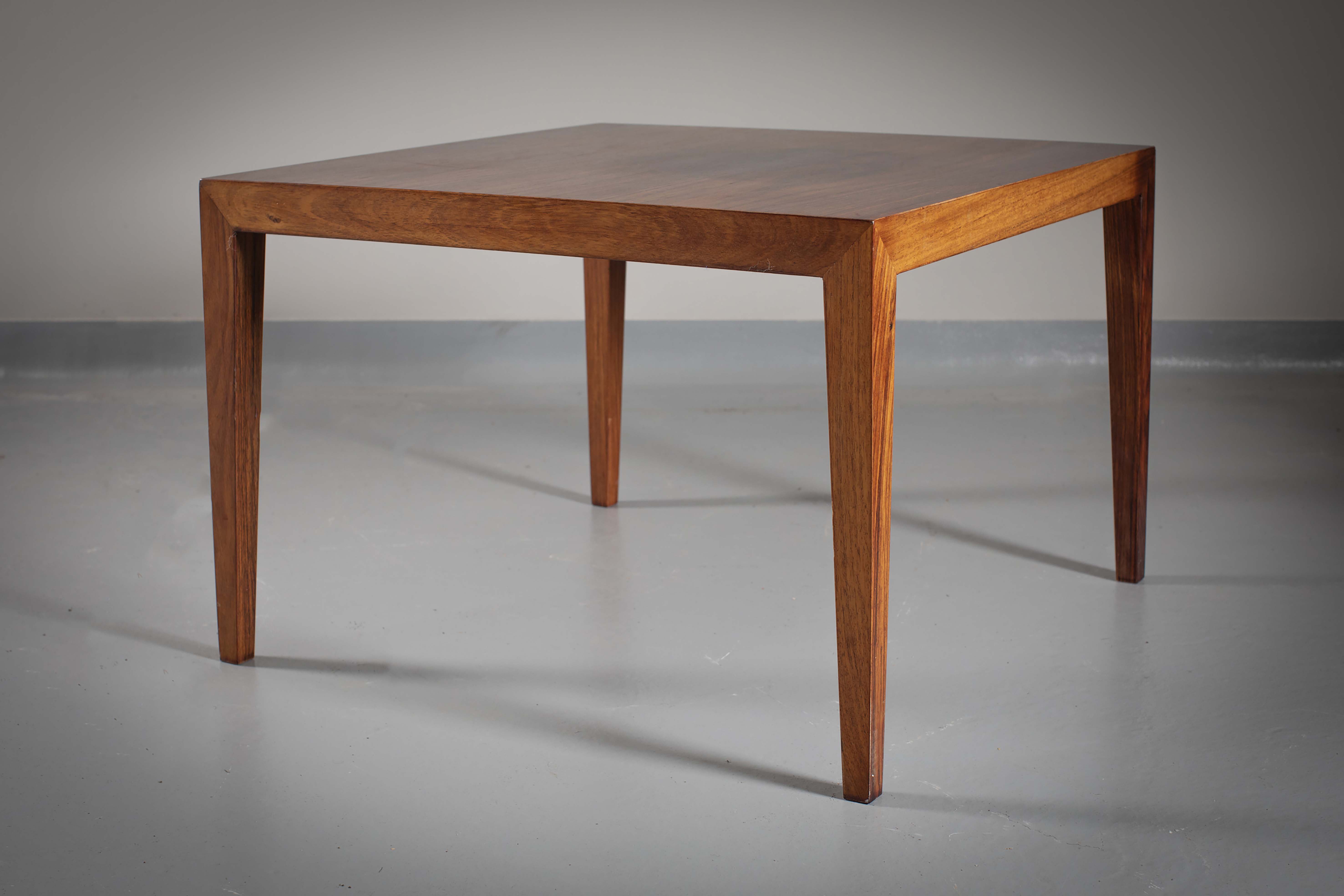 A ROSEWOOD LOW TABLE