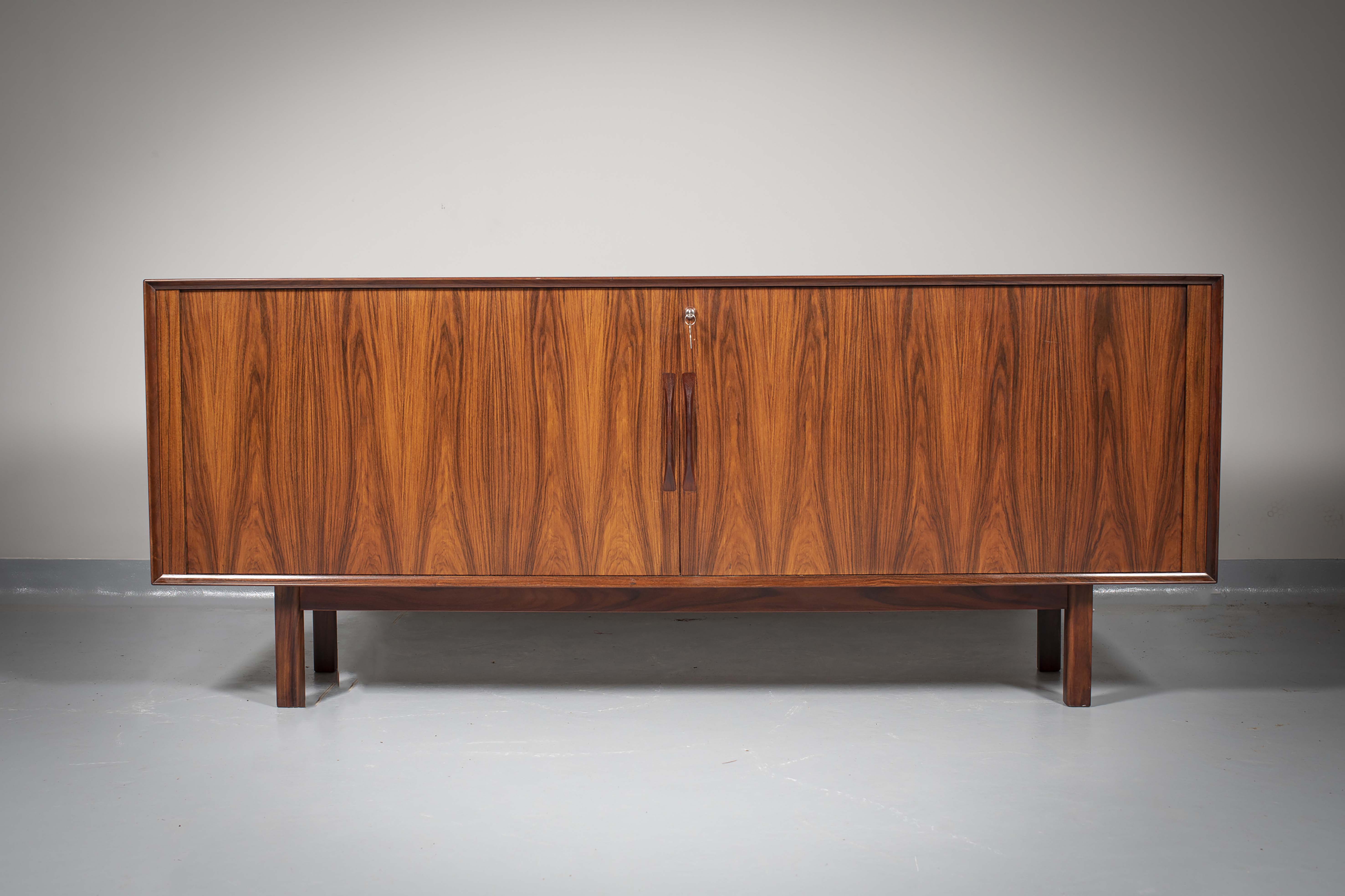 A ROSEWOOD SIDEBOARD by Arne Vodder