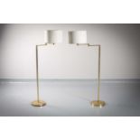 A PAIR OF BRASS ADJUSTABLE FLOOR LAMPS, FRENCH 1970s, on circular bases, 135cm (h)