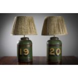 A PAIR OF EARLY 19TH CENTURY TOLEWARE TEA URNS, converted to table lamps, individually numbered 19