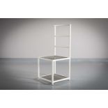 A WHITE METAL AND MESH SINGLE CHAIR by Andree Putman