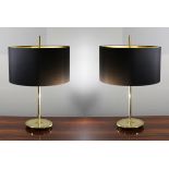 A PAIR OF GILT TABLE LAMPS, 71cm high.