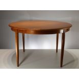 A TEAK "MODEL 15" EXTENDING DINING TABLE, by Niels Otto Moller, Danish 1960's, for J.L. Moller, with