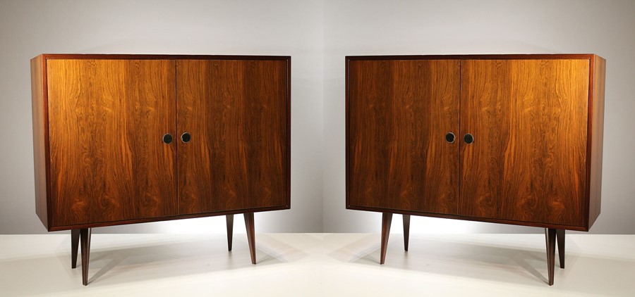 A PAIR OF ROSEWOOD SIDE CABINETS, ITALIAN 1960's BY VITTORIO DASSI, with a pair of panel doors,