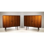 A PAIR OF ROSEWOOD SIDE CABINETS, ITALIAN 1960's BY VITTORIO DASSI, with a pair of panel doors,