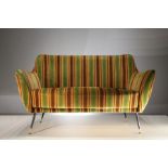 AN UPHOLSTERED TWO SEAT SOFA, ITALIAN 1960s, on splayed metal legs with brass feet, 143cm (w) x 85cm