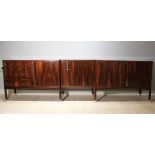 A ROSEWOOD MODULAR SIDEBOARD, ITALIAN 1960s BY VITTORIO DASSI, comprising a pair of cabinets, each