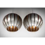 A PAIR OF METAL PENDANT LIGHTS, IN THE MANNER OF LOUIS WEISDORFF, 90cm high x 40cm (diam).