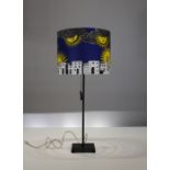 A "SOL DI CAPRI" TABLE LAMP by Piero Fornasetti, signed 77cms high