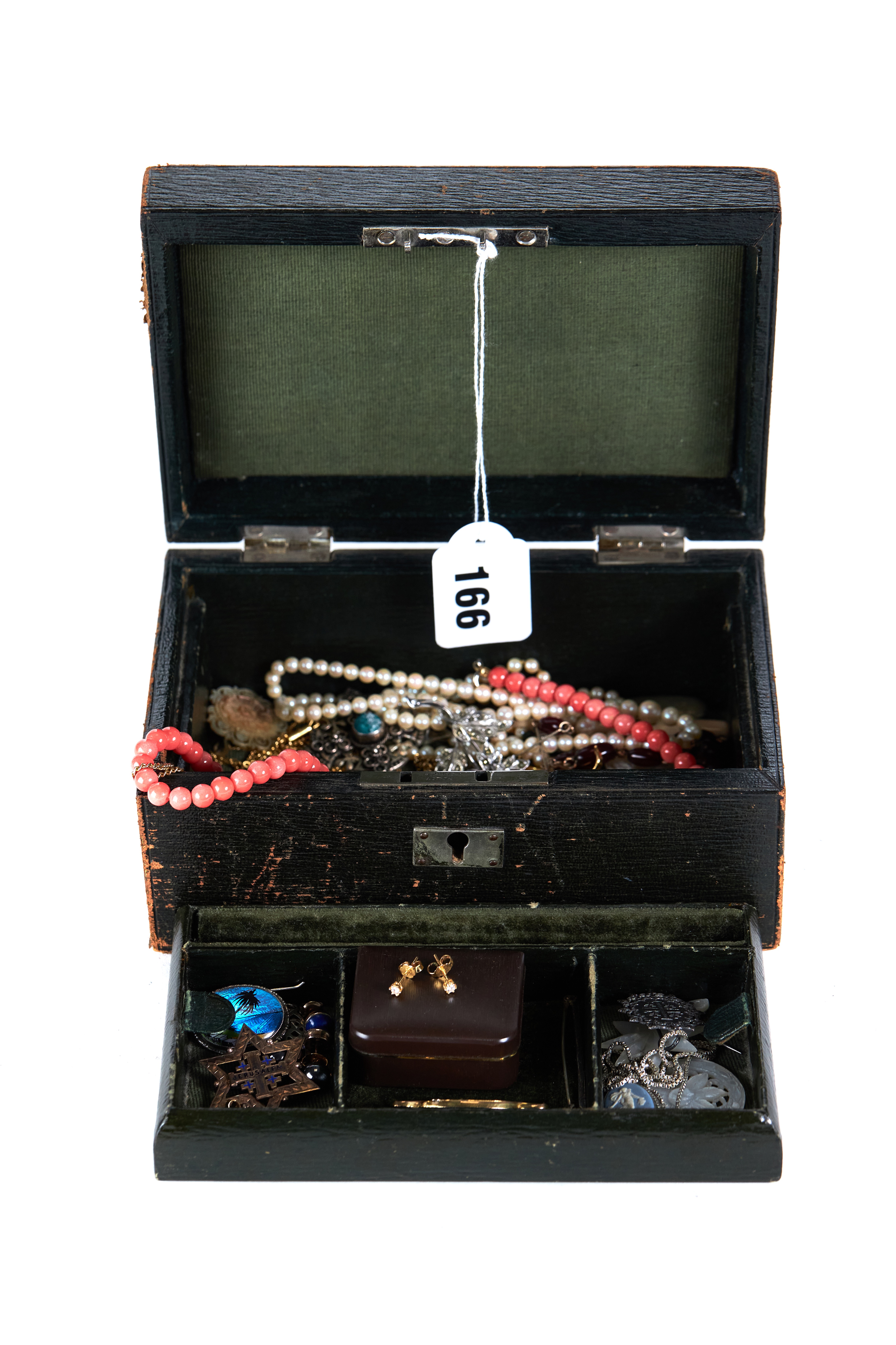 A BLACK LEATHER JEWELLERY BOX containing a 9ct gold "BABY" BROOCH,