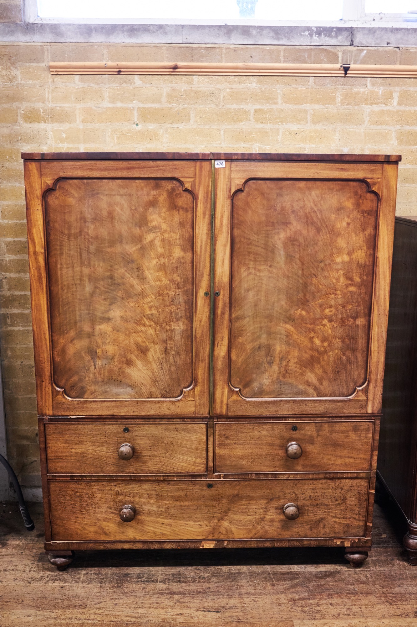 A GEORGE IV MAHOGANY DWARF LINEN PRESS,