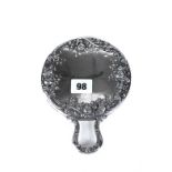 AN AMERICAN GORHAM STERLING SILVER HAND MIRROR with embossed floral decoration and loop handle,