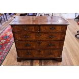 AN EARLY 18TH CENTURY WALNUT VENEERED CHEST OF DRAWERS,