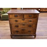 AN 18TH CENTURY OAK AND WALNUT VENEERED CHEST OF DRAWERS, two short and three long drawers,