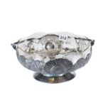 AN EARLY 20TH CENTURY ORVIT PEWTER SWING HANDLED FRUIT BOWL cast with flower heads and leaves,