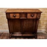 A 19TH CENTURY ROSEWOOD SIDE CABINET, two frieze drawers above a pair of panelled doors,