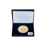A 1997 ELIZABETH AND PHILIP 1947-1997 GOLD PLATED 100 CROWN COIN, 5oz, boxed.